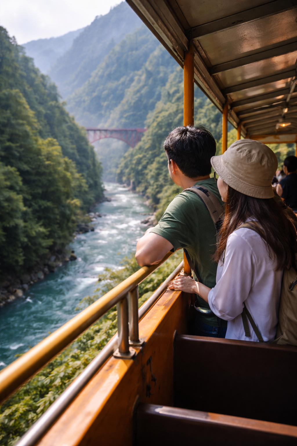 Couple looking from train in Kurobe Gorge